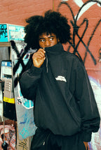 BLACK SHELL TRACKTOP