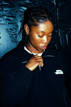 BLACK SHELL TRACKTOP
