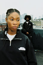BLACK SHELL TRACKTOP
